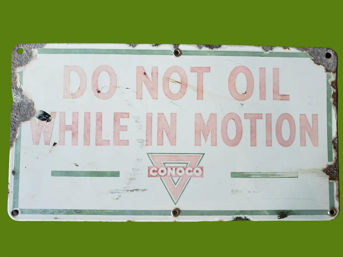 Conoco Do Not Oil While In Motion Porcelain Sign 1