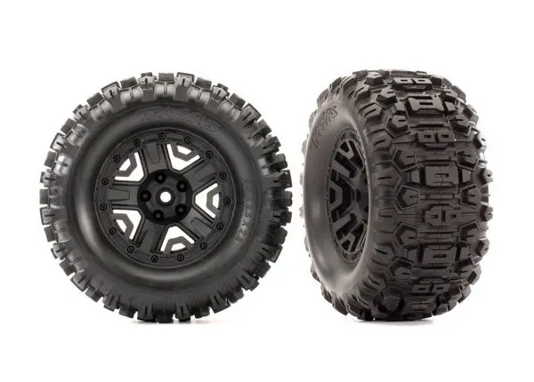 Traxxas Tires & Wheels, Assembled, Glued (2.8") (Rustler 4X4 Black Wheels, Sledgehammer Tires, Foam Inserts) (2) (Tsm Rated) 1