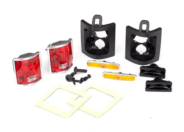 Traxxas Tail Lights, Left & Right (Assembled)/ Tail Light Retainers, Left & Right/ Side Marker Lights (Assembled) (2)/ Side Marker Retainers (2)/ Mounting Tape (2)/ 1.6X5 Bcs (Self-Tapping) (4)/ 2.6X8 Bcs (2) 1